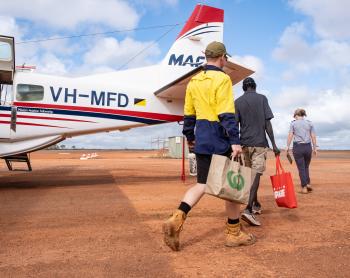 Passengers approaching aircraft