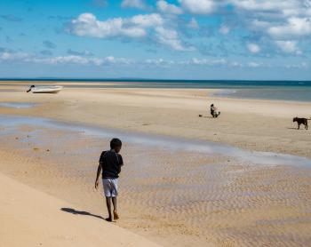 People on beacg at low tide