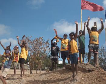Students waving farewell 