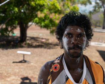 Young Yolngu man looking into camera
