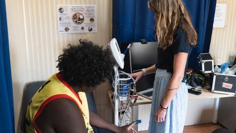 A nurse and patient in a homeland clinic