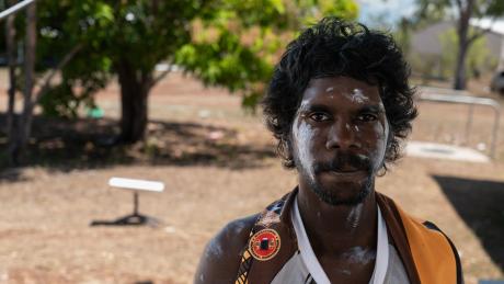 Young Yolngu man looking into camera