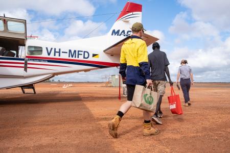 Passengers approaching aircraft