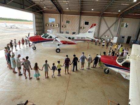 MAF Arnhem Land staff and families gathered in the hangar to welcome the new aircraft. 