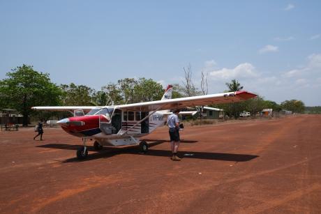 GA8 aircraft on dirt airstrip