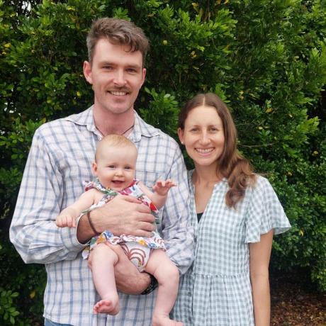 Man, woma and baby family photo